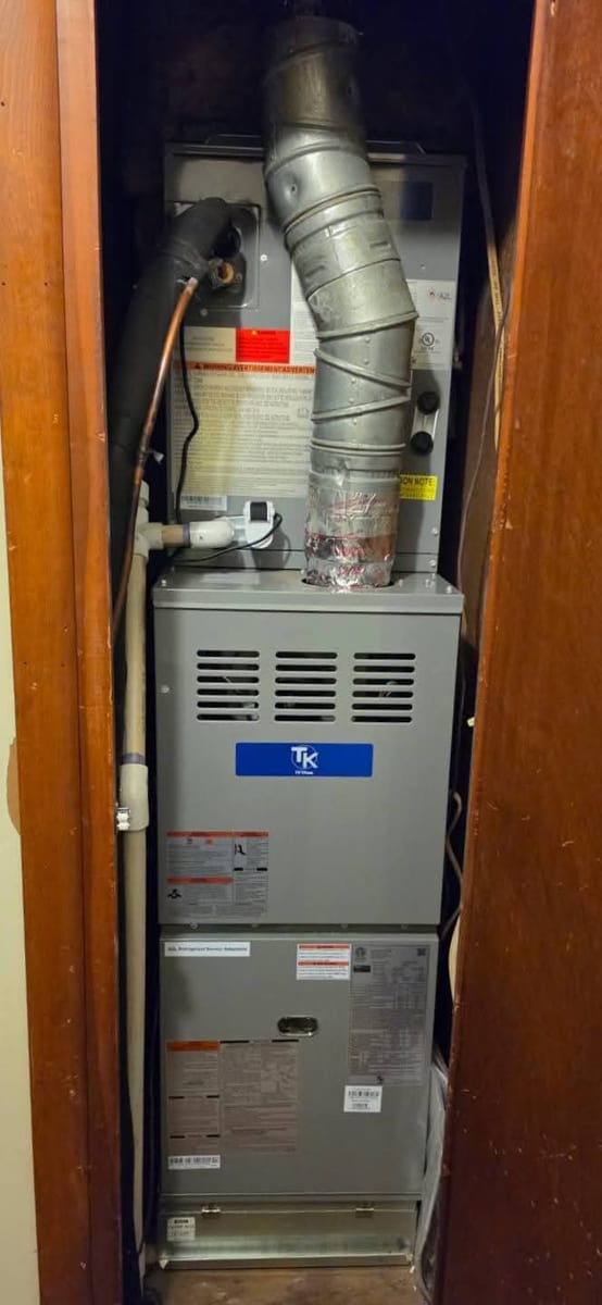Gas furnace installed in a utility closet