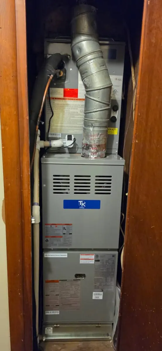 Gas furnace installed in a utility closet