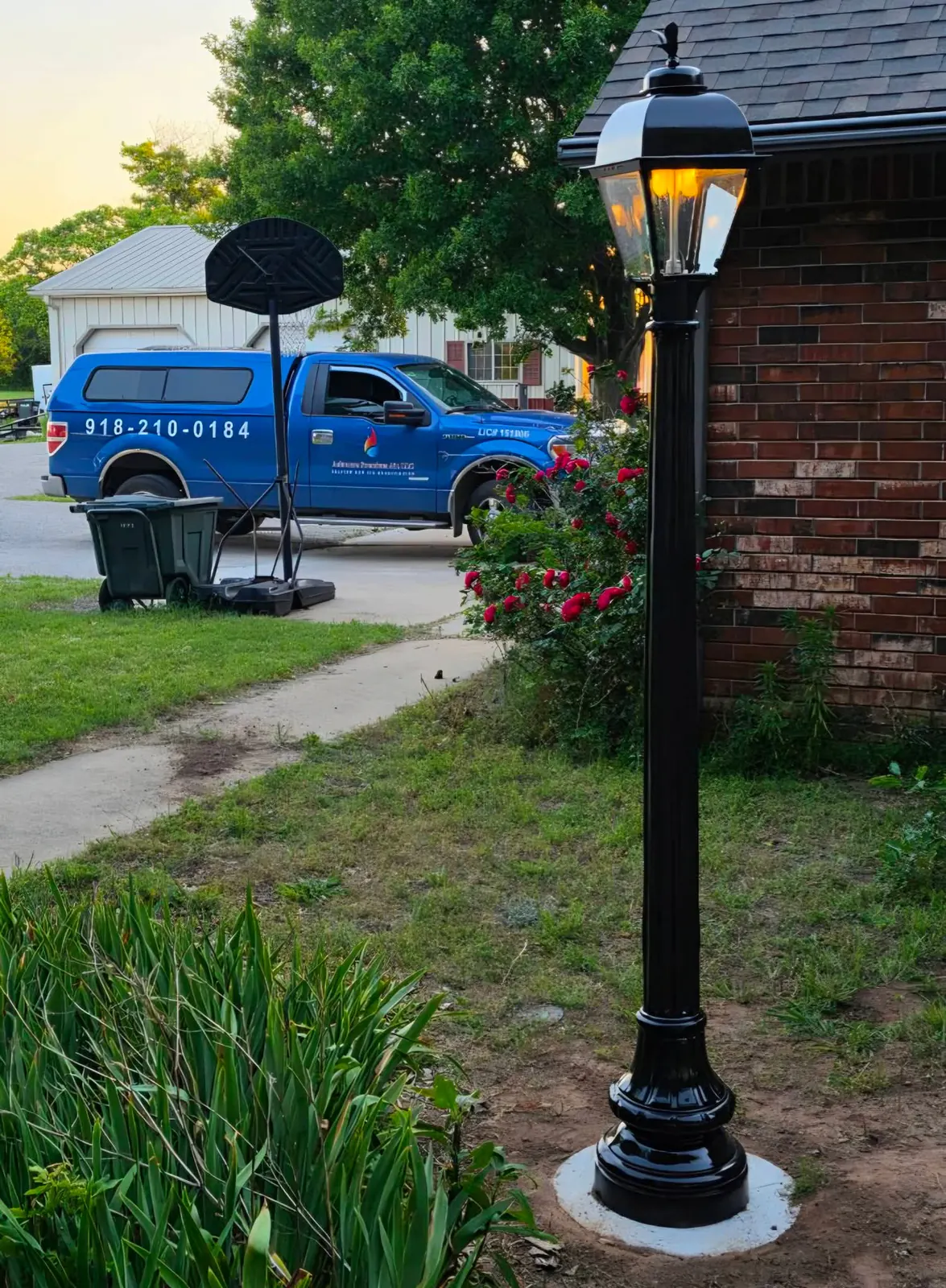 Ashmore Premium Air service truck at a gas lamp installation in Tulsa, Oklahoma